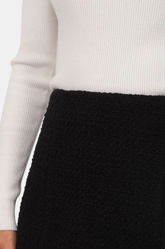 Falda negra en tweed
